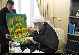 ادای احترام به پرچم بارگاه رضوی در شورای نگهبان